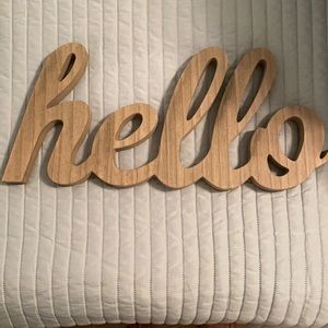 “Hello” cut out wooden sign